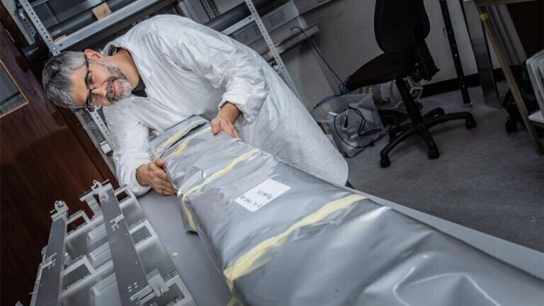 University of Liverpool Physicist, Dr Giacomo Contin, prepares the staves for shipment from Daresbury to CERN. (Credit: STFC)
